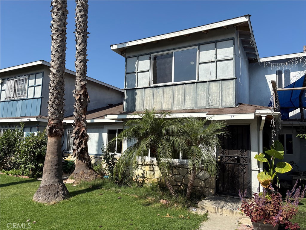 28 Paradise Valley North Carson, CA 90745 - Photo 6 of 17 a view of a house with sitting area and garden