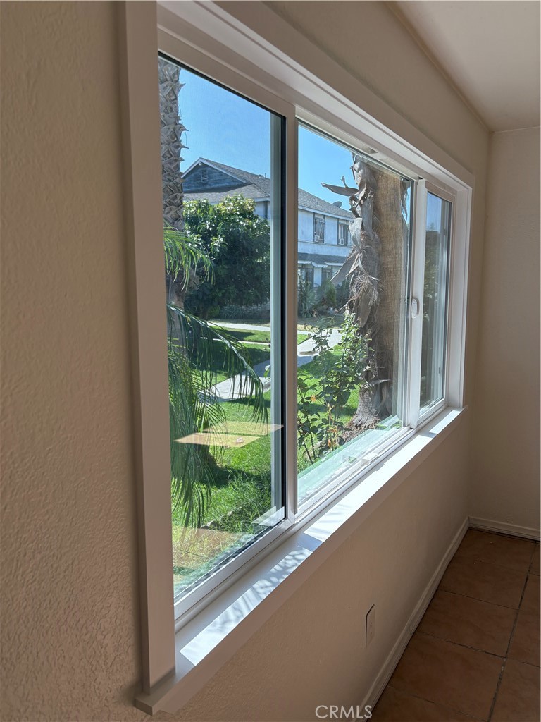 28 Paradise Valley North Carson, CA 90745 - Photo 7 of 17 a view of a room with a large window and wooden floor