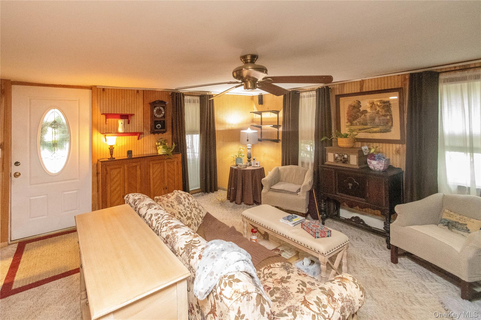 62 Thornton Road Wurtsboro, NY 12790 - Photo 9 of 30 a bedroom with furniture and a large window
