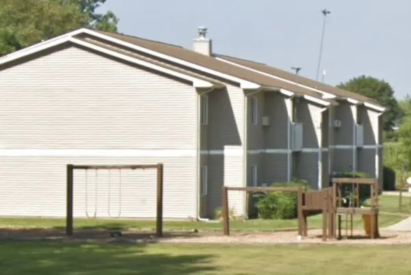 a view of a house with a swimming pool