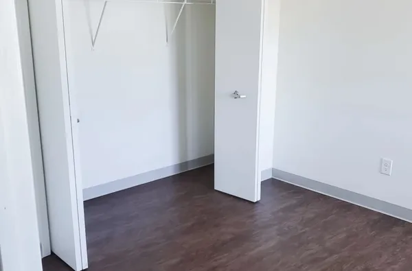 a room with a sink cabinets and utility room