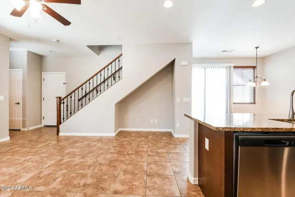 a view of entryway and kitchen