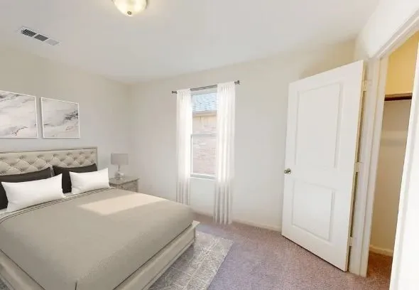 a bathroom with a double vanity sink and mirror