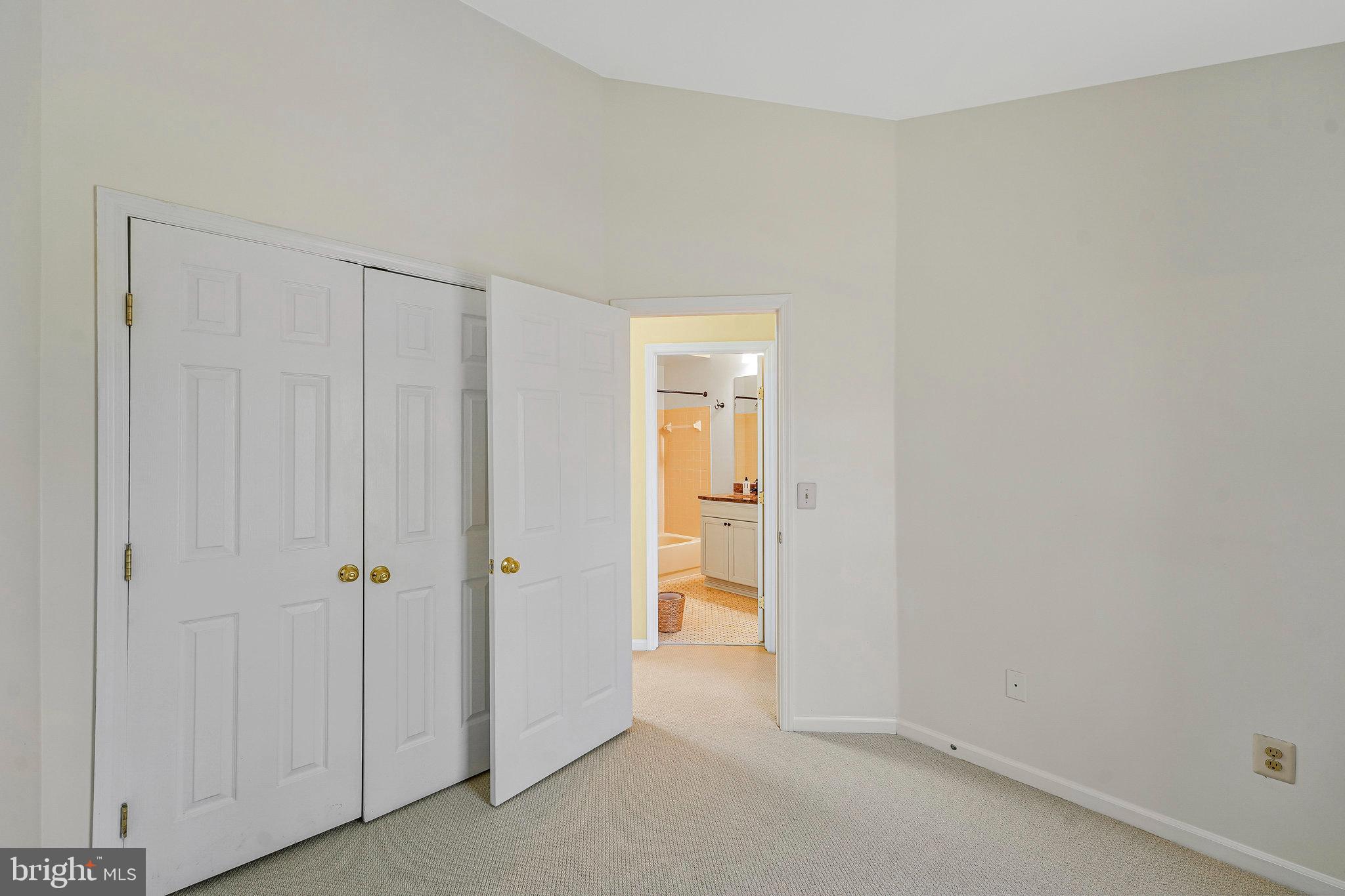 6556 Antrican Drive Springfield, VA 22150 - Photo 18 of 36 an empty room with closet area