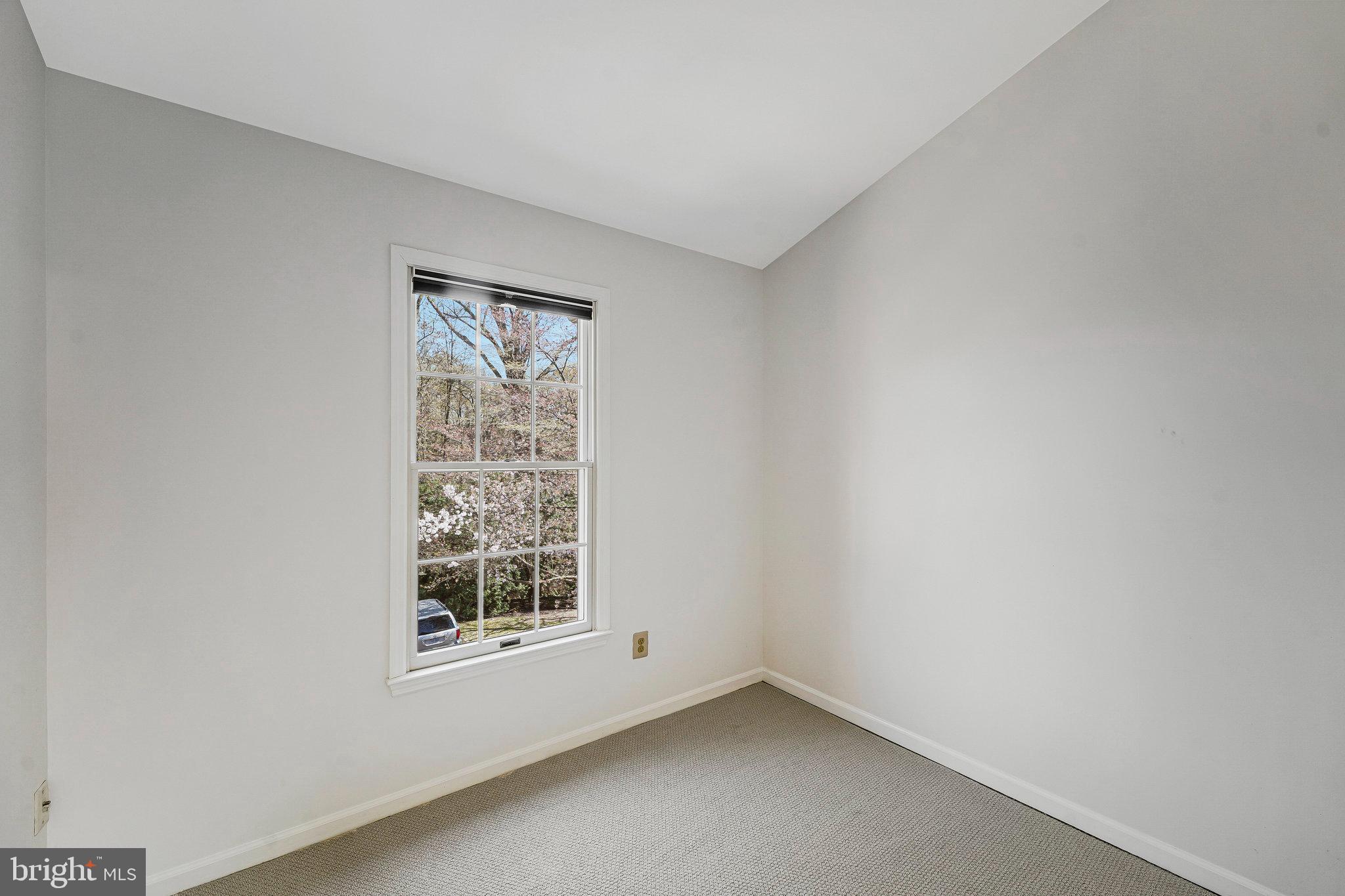 6556 Antrican Drive Springfield, VA 22150 - Photo 19 of 36 a view of an empty room with a window