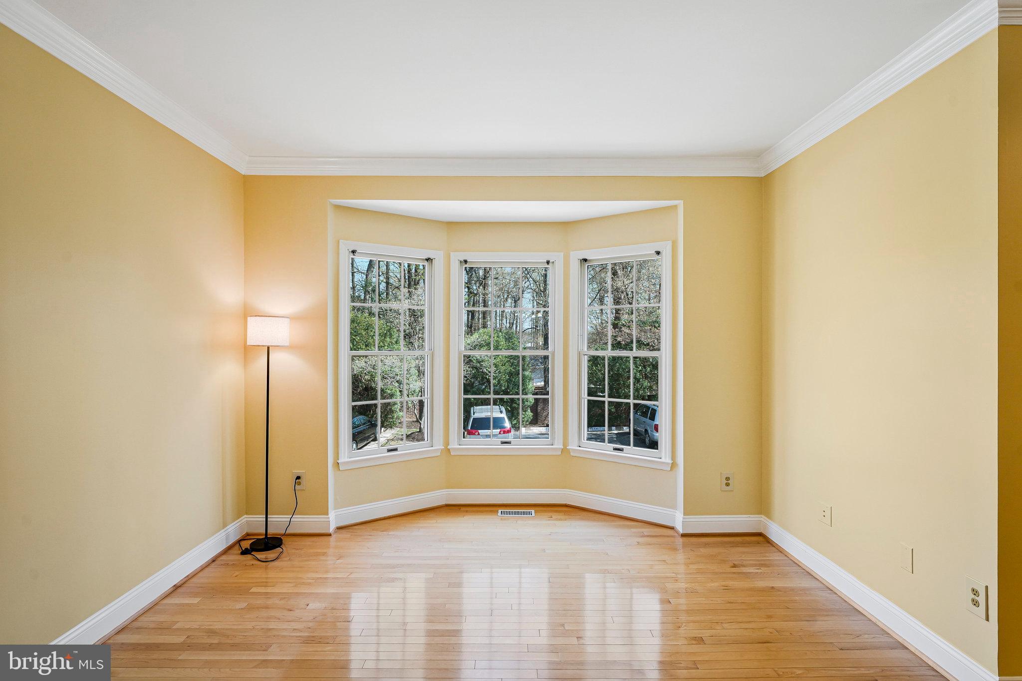 6556 Antrican Drive Springfield, VA 22150 - Photo 3 of 36 a view of an empty room with a window