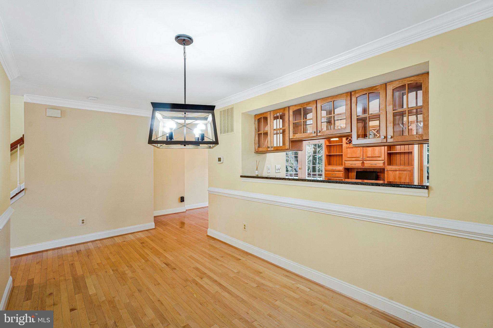 6556 Antrican Drive Springfield, VA 22150 - Photo 6 of 36 a bedroom with bed and a window