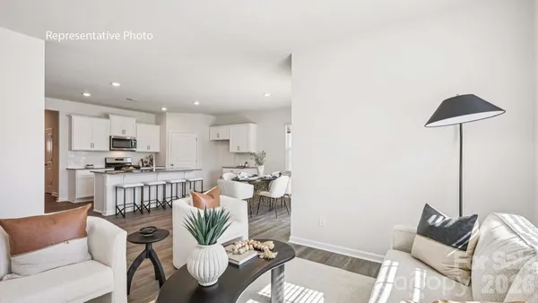 a living room with furniture and a table