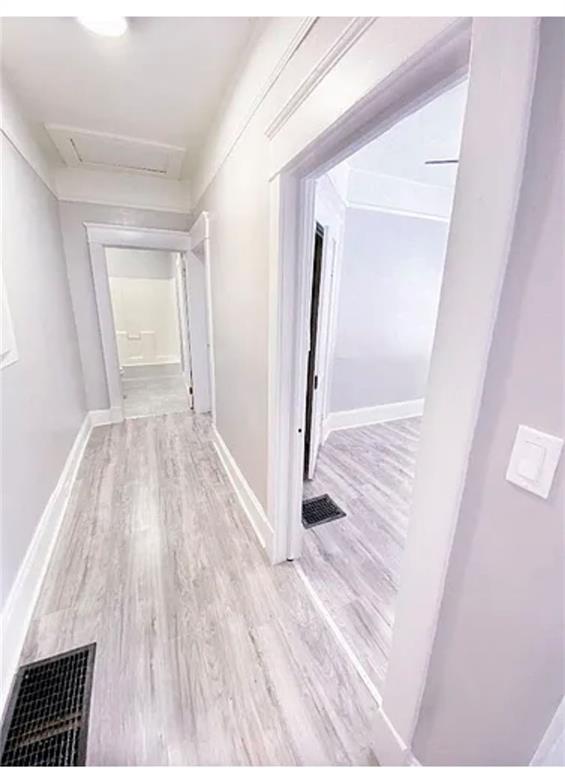 1127 Metropolitan Parkway Southwest Atlanta, GA 30310 - Photo 15 of 23 a view of a hallway with wooden floor and staircase