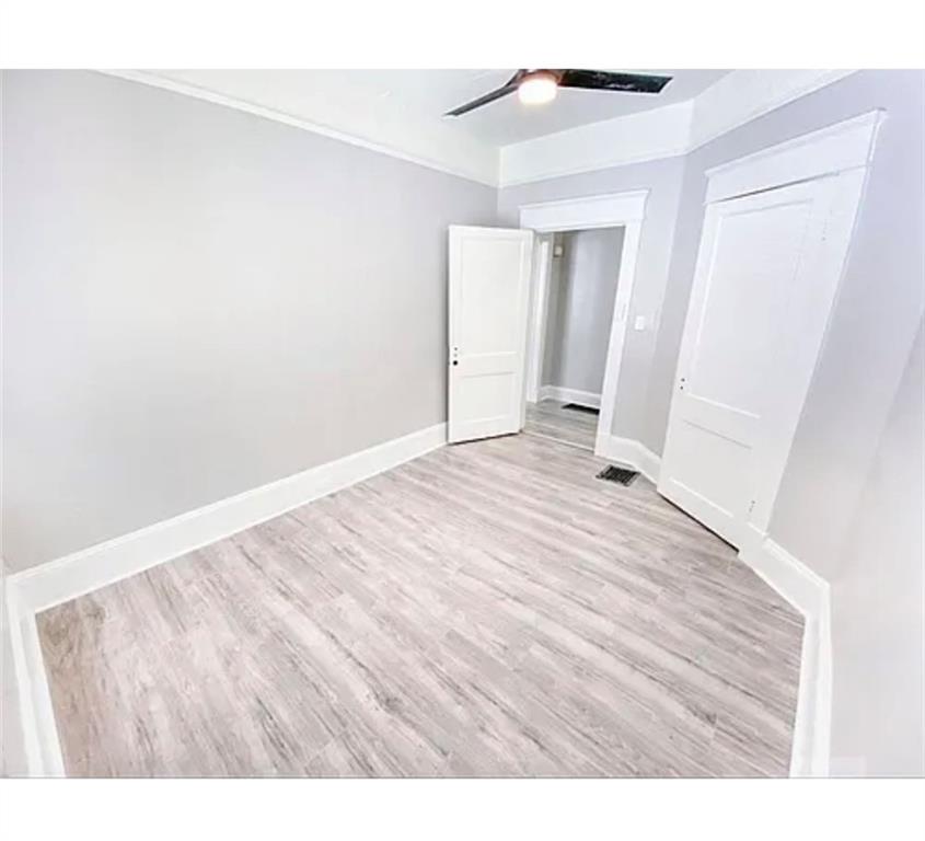1127 Metropolitan Parkway Southwest Atlanta, GA 30310 - Photo 17 of 23 a view of an empty room and wooden floor