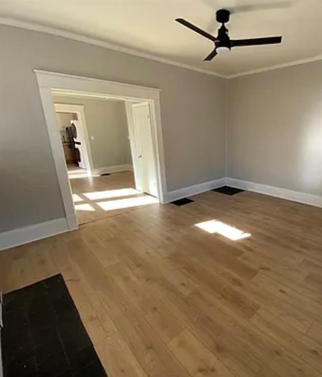 1127 Metropolitan Parkway Southwest Atlanta, GA 30310 - Photo 3 of 23 a view of empty room with wooden floor