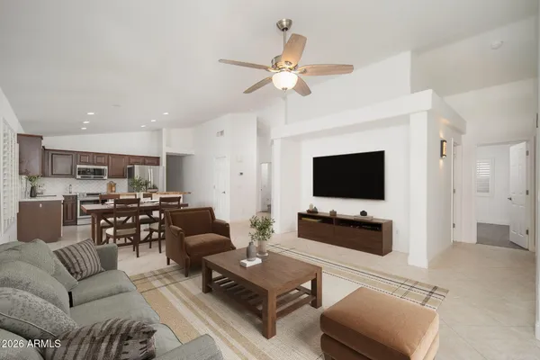 a view of a dining room with furniture window and outside view