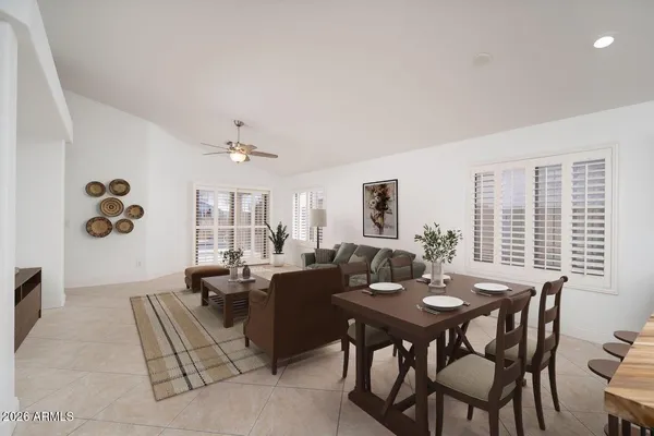a kitchen with stainless steel appliances a stove microwave and sink