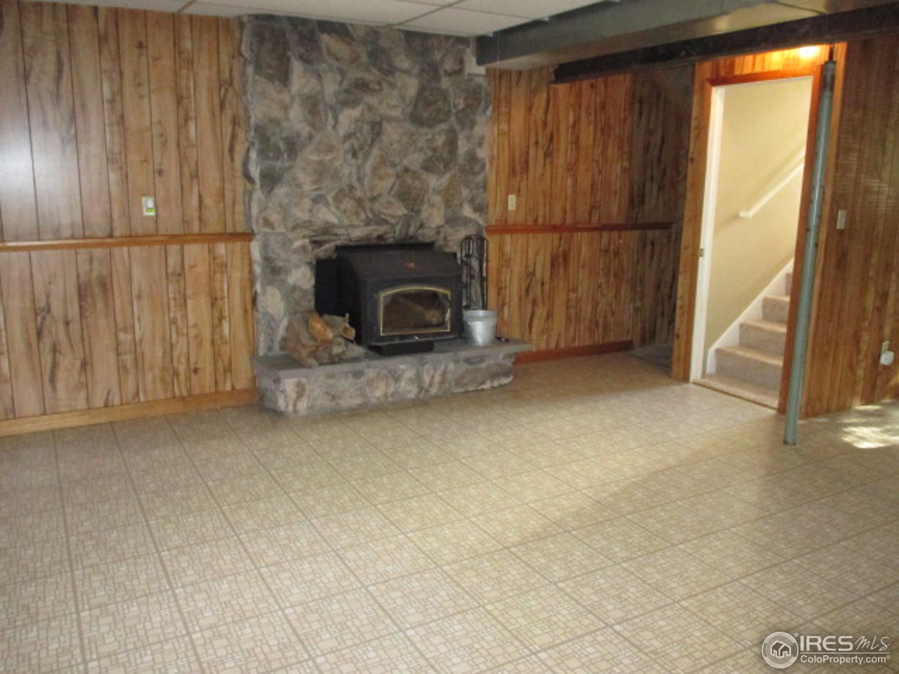 3317 Post Road Laporte, CO 80535 - Photo 9 of 14 Family Room with Wd Stove Insert
