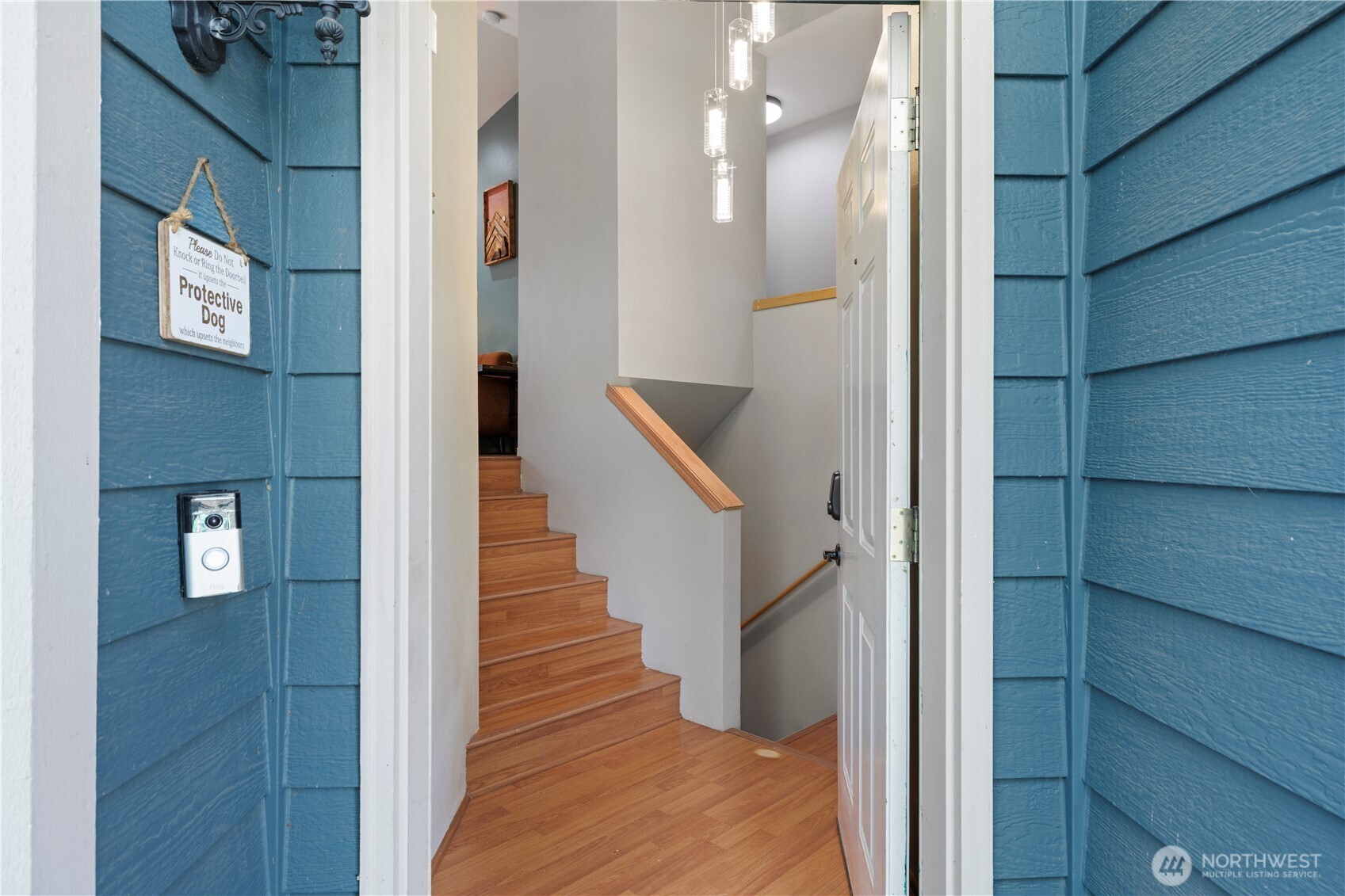 6352 24th Avenue Southwest Seattle, WA 98106 - Photo 3 of 31 a view of entryway and hall with wooden floor