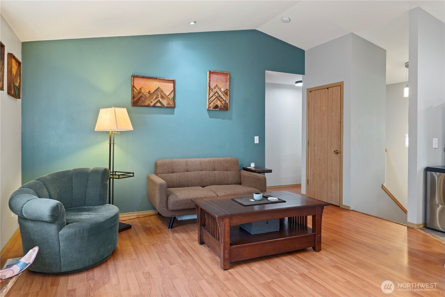 6352 24th Avenue Southwest Seattle, WA 98106 - Photo 4 of 31 a living room with furniture and a wooden floor
