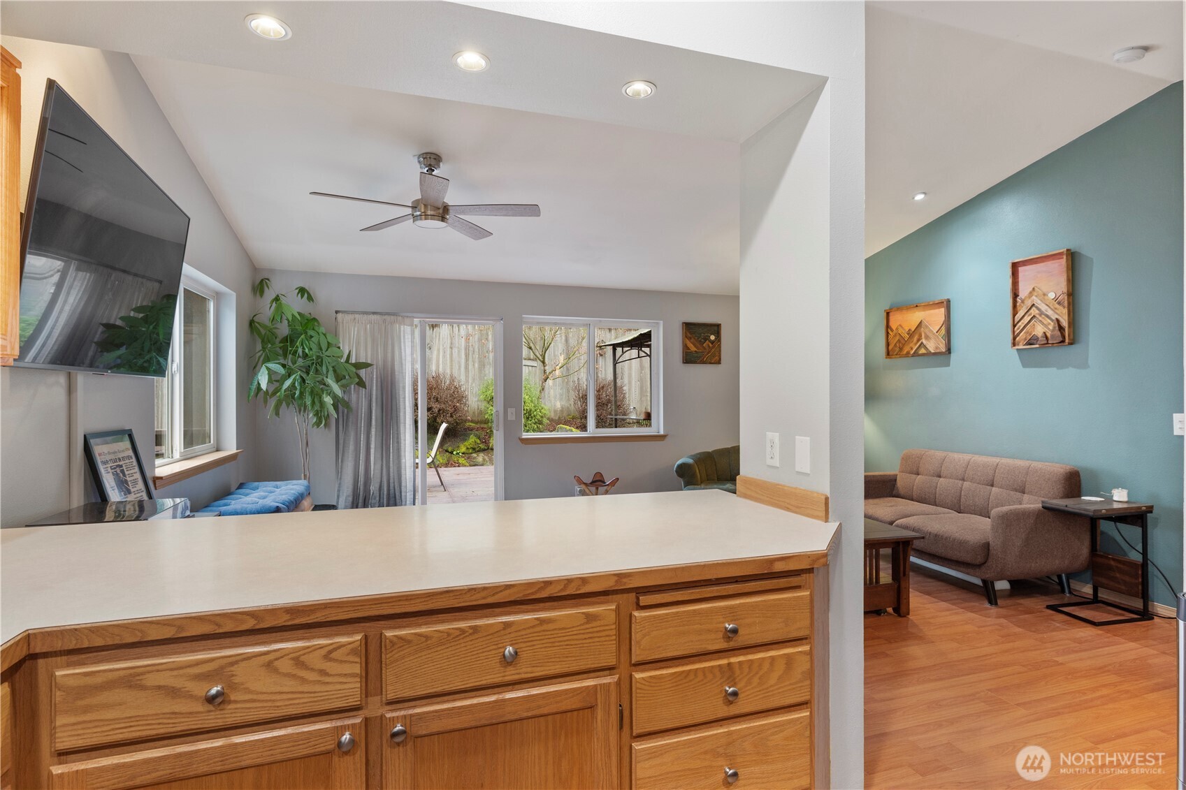 6352 24th Avenue Southwest Seattle, WA 98106 - Photo 5 of 31 a living room with furniture and a flat screen tv