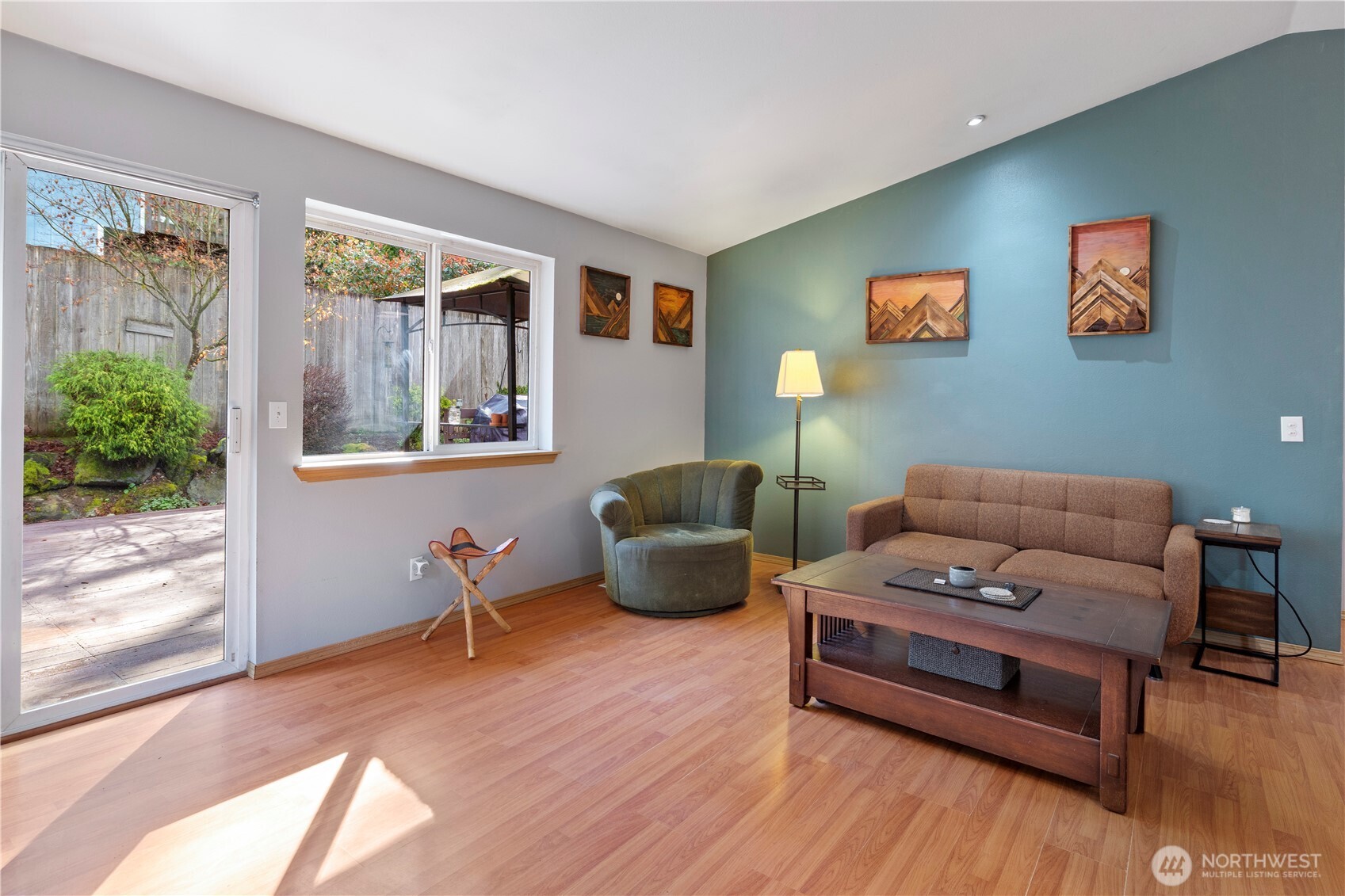 6352 24th Avenue Southwest Seattle, WA 98106 - Photo 8 of 31 a living room with furniture and a wooden floor