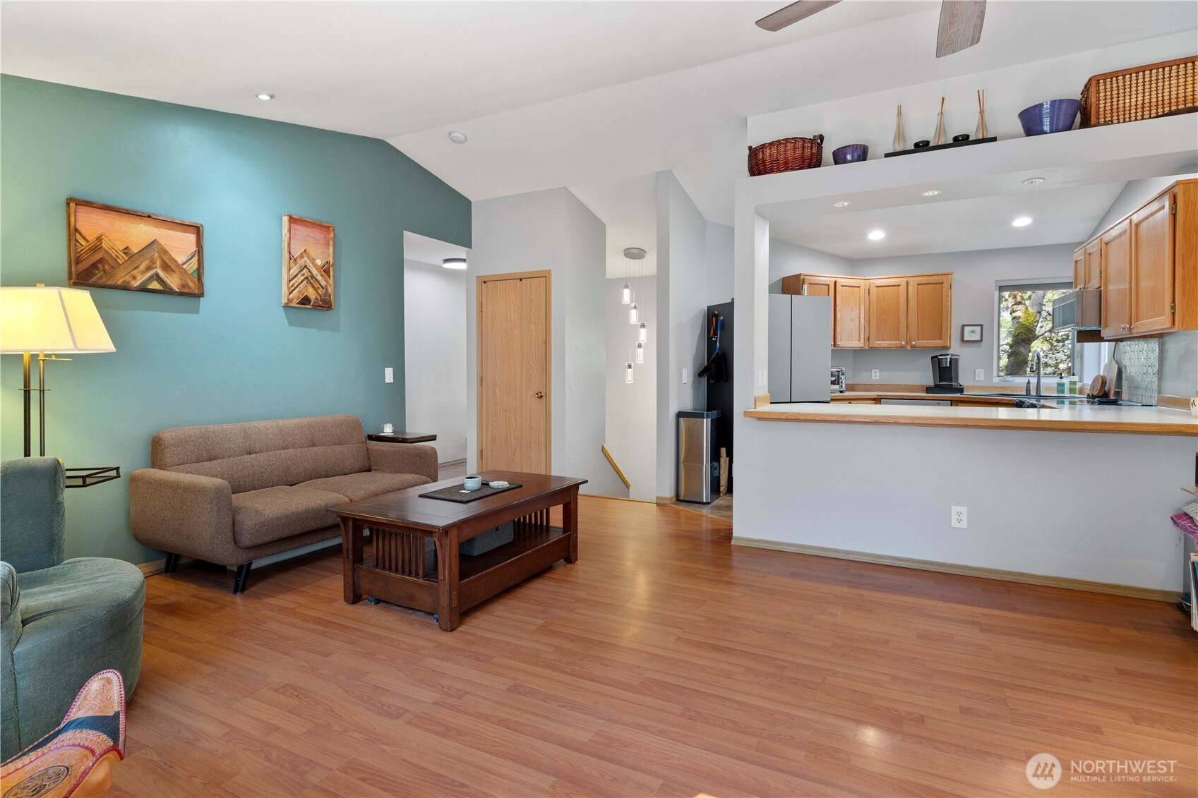 6352 24th Avenue Southwest Seattle, WA 98106 - Photo 9 of 31 a living room with furniture and a wooden floor