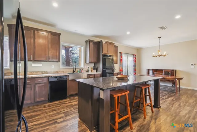 a view of a livingroom with furniture and window