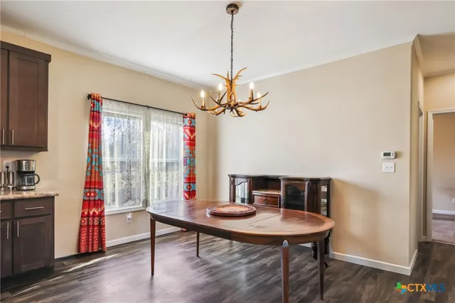 a room with gym equipment and windows