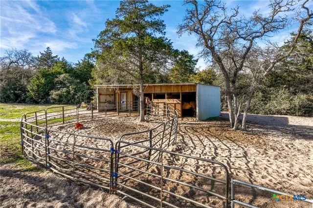a view of a swimming pool with a yard