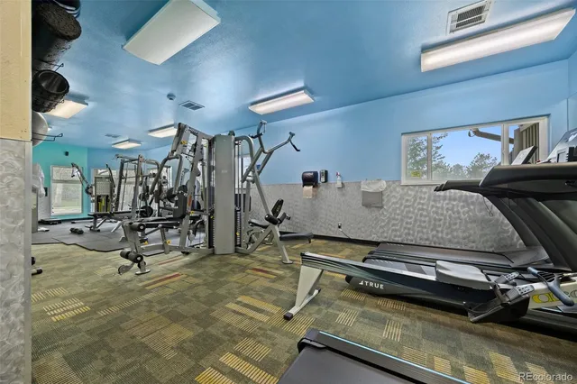a view of a room with gym equipment