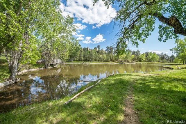 a view of a lake with a big yard