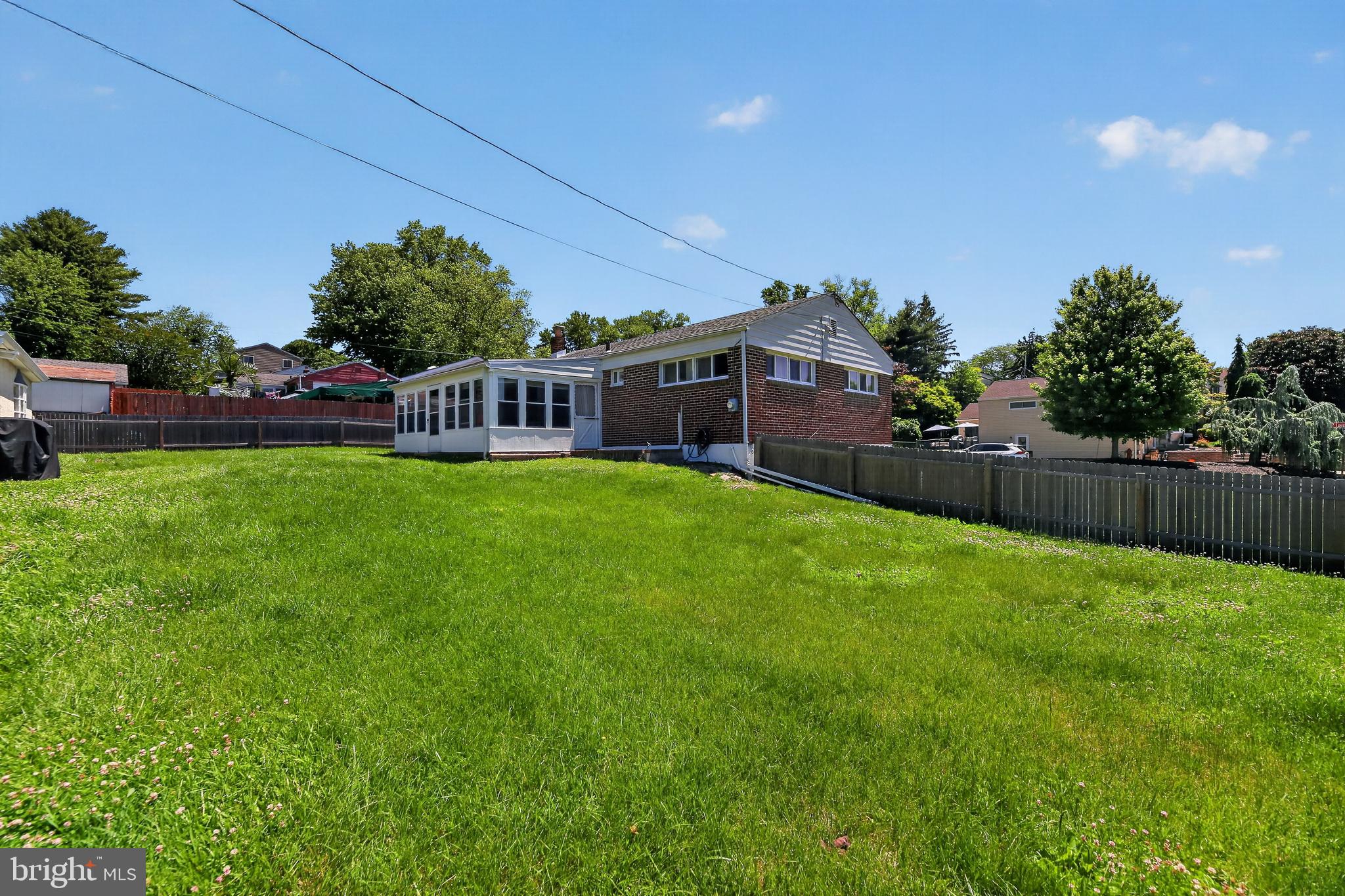 504 Louise Road Glenside, PA 19038 - Photo 3 of 41 Spacious backyard with sunny charm.