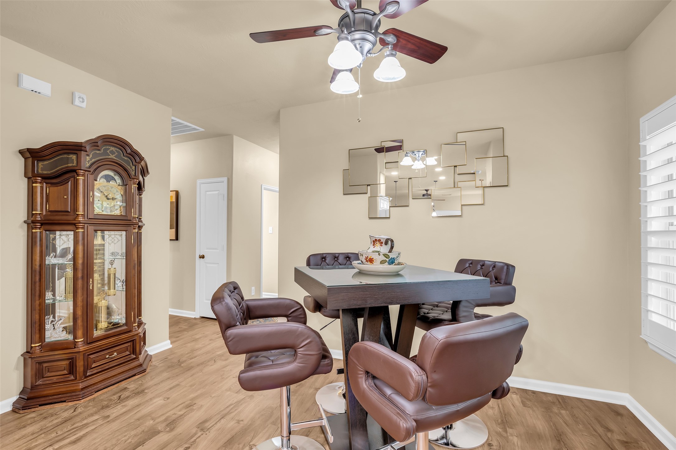 209 East George Jones Road Livingston, TX 77351 - Photo 8 of 26 Whether it is for your morning coffee or cocktails with company, this cozy nook is perfect for gathering.