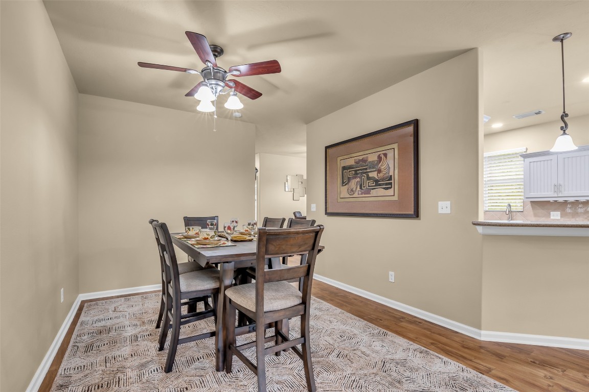 209 East George Jones Road Livingston, TX 77351 - Photo 9 of 26 Ready to entertain? The spacious dining room is conveniently located adjacent to the breakfast bar top, creating the ultimate serving space.