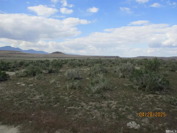 a view of a city and mountains