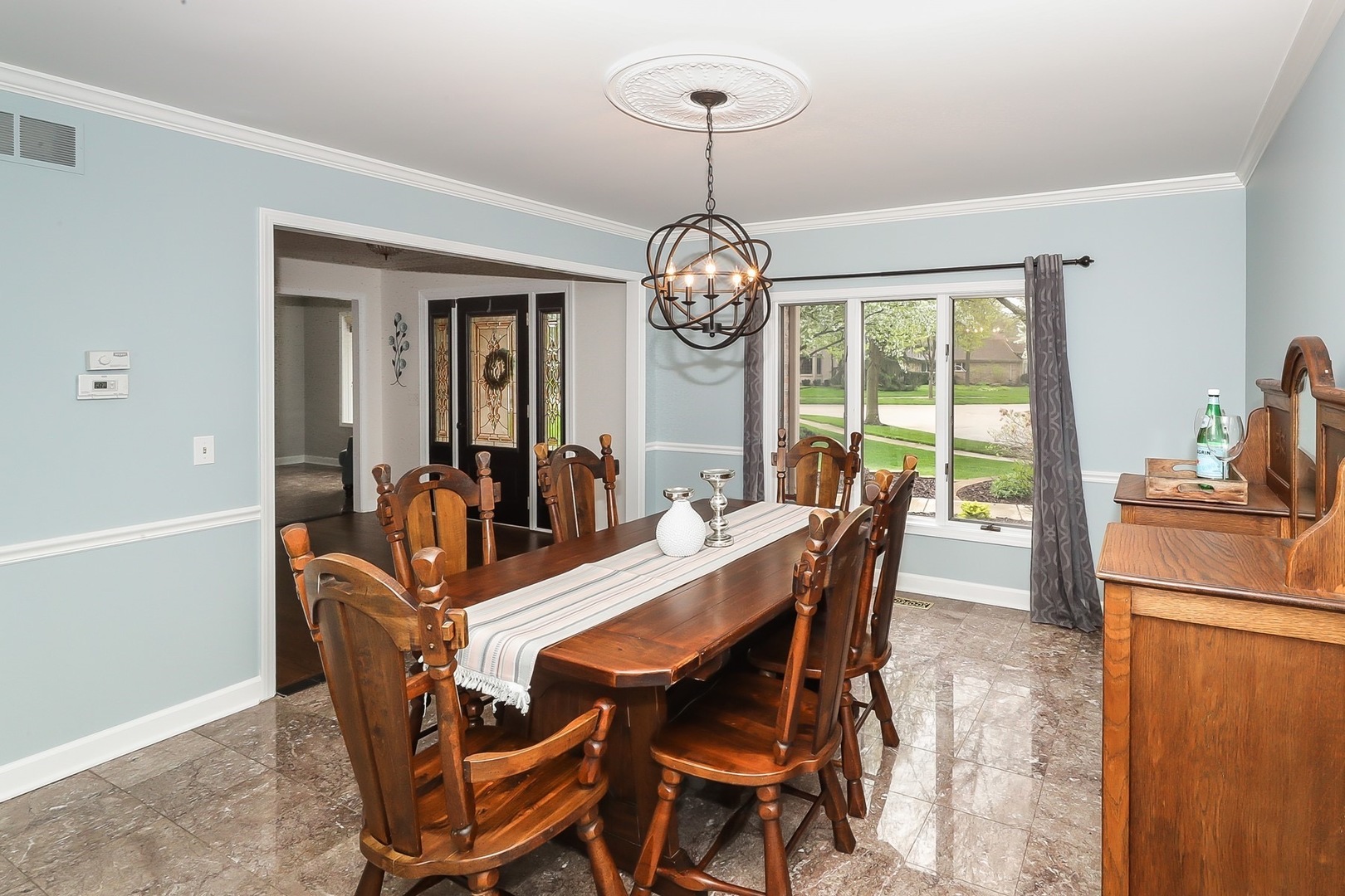 2605 Turnberry Road St. Charles, IL 60174 - Photo 3 of 35 a view of a dining room with furniture window and outside view