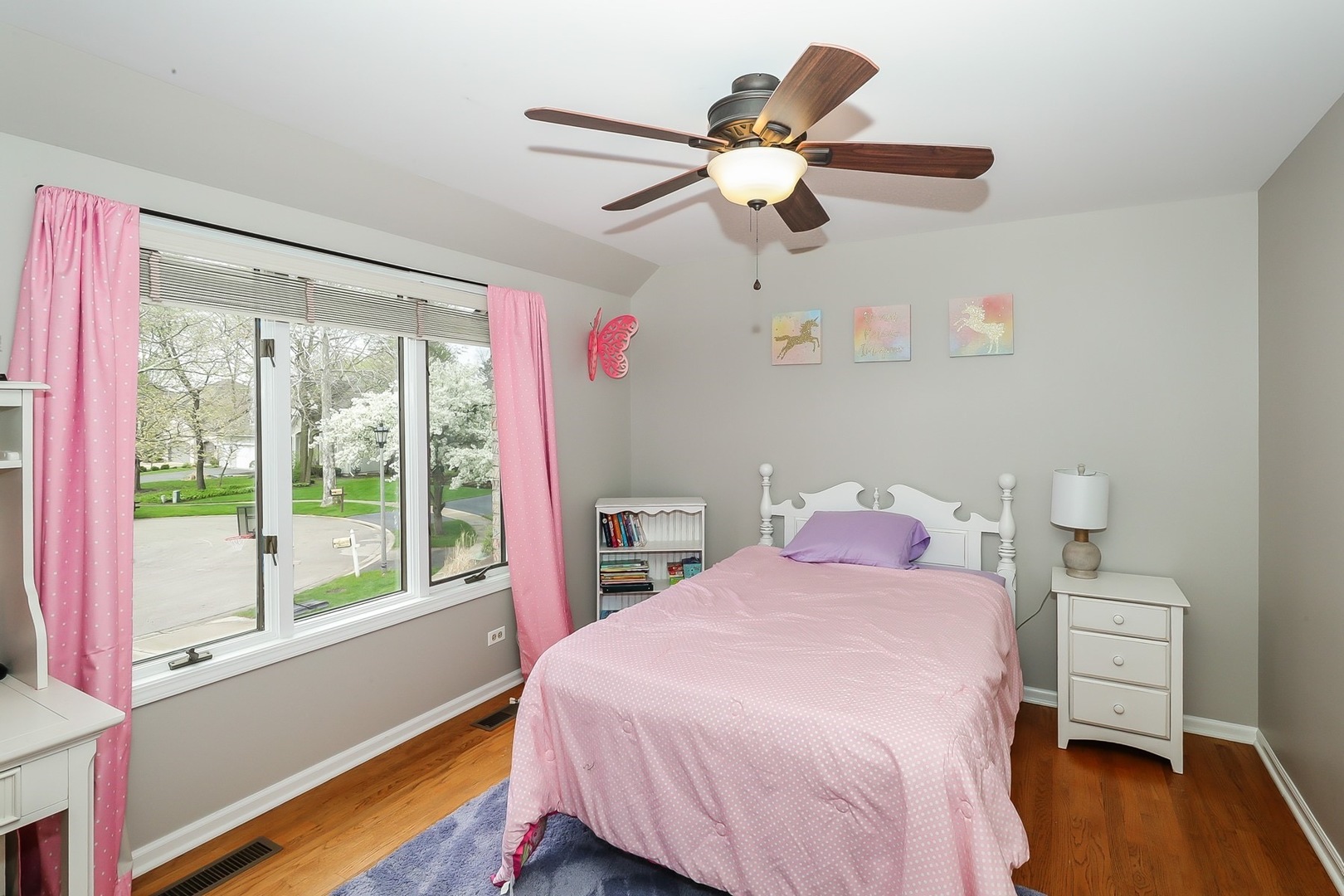 2605 Turnberry Road St. Charles, IL 60174 - Photo 22 of 35 a bedroom with a bed and a chandelier