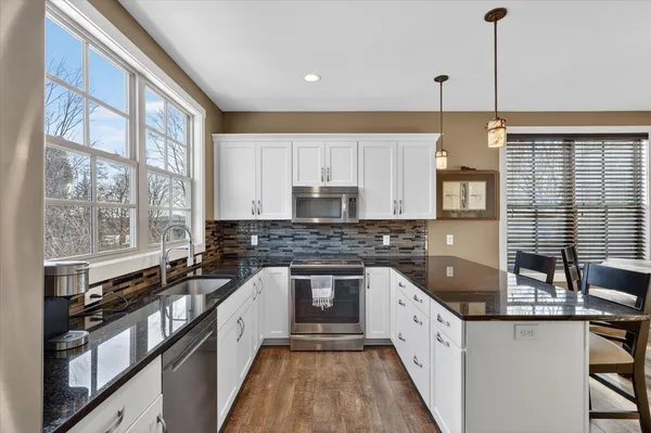 $420,000 | 2022 Celadon Drive Northeast, Unit 106, Grand Rapids, MI 49525