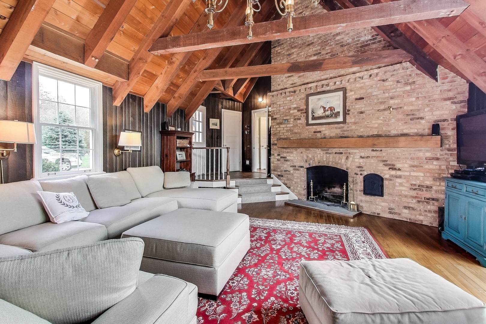 2 Far Hills Road Barrington Hills, IL 60010 - Photo 22 of 37 a living room with furniture and a fireplace