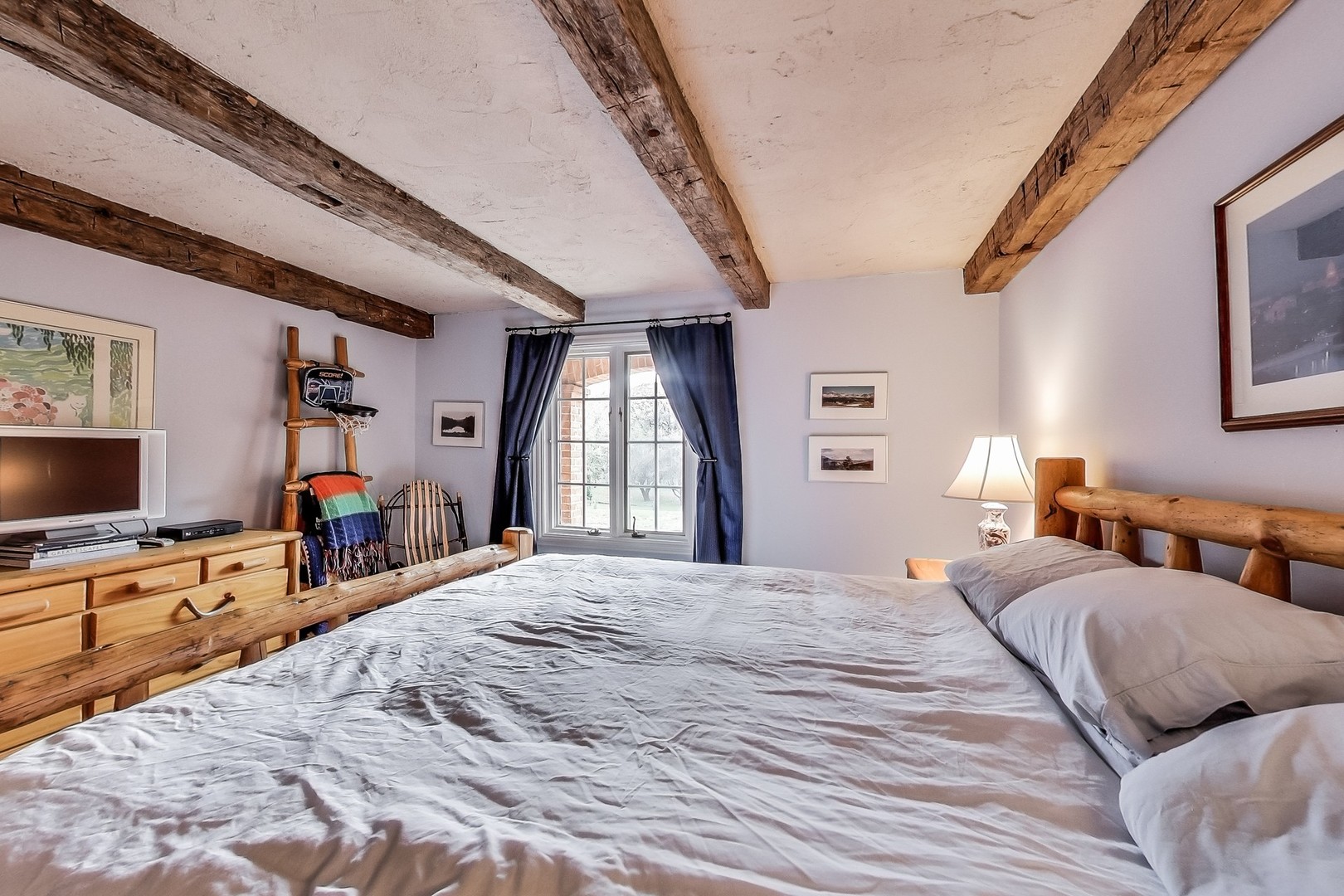 2 Far Hills Road Barrington Hills, IL 60010 - Photo 30 of 37 a bedroom with a large bed and a flat tv screen on dresser