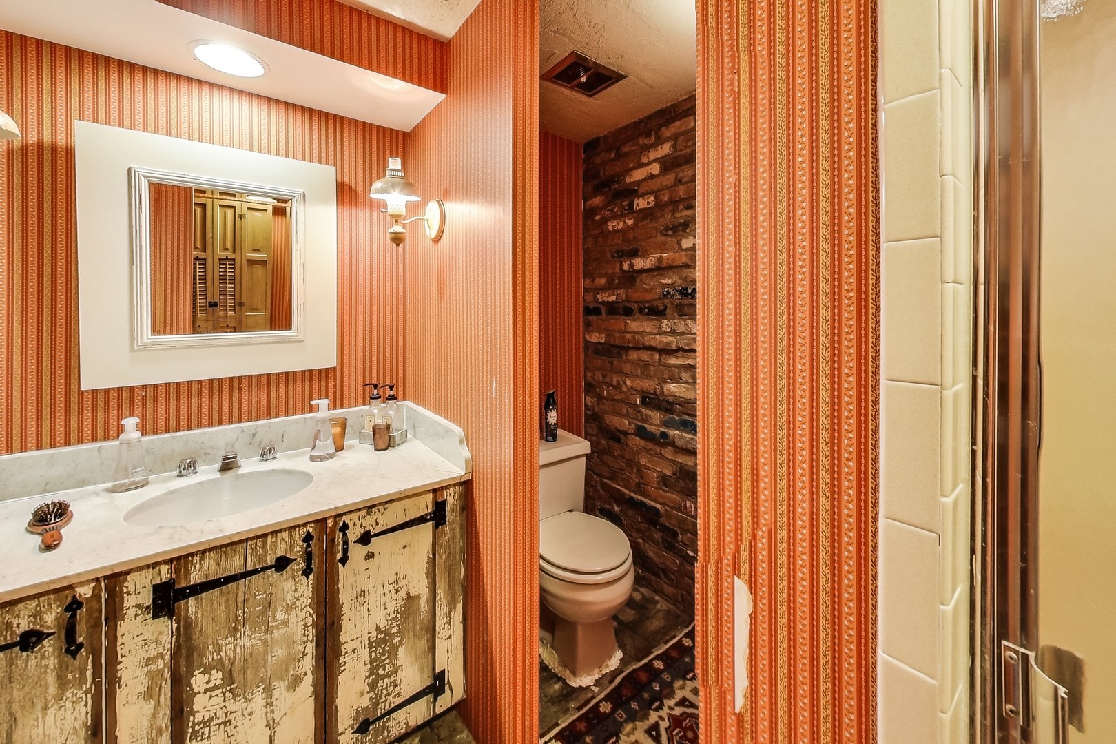 2 Far Hills Road Barrington Hills, IL 60010 - Photo 31 of 37 a bathroom with a sink a toilet and shower curtain