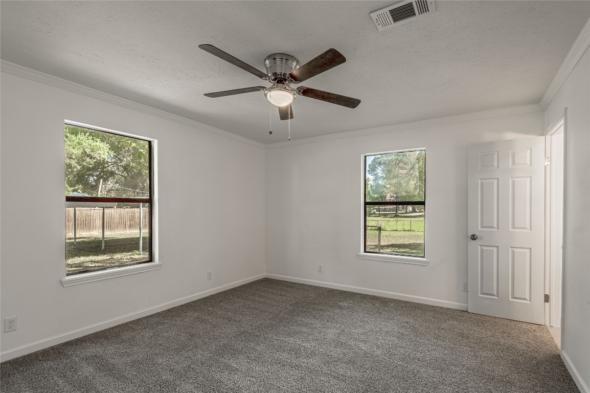 169 Sunset Drive Trinity, TX 75862 - Photo 14 of 36 a view of an empty room with a window