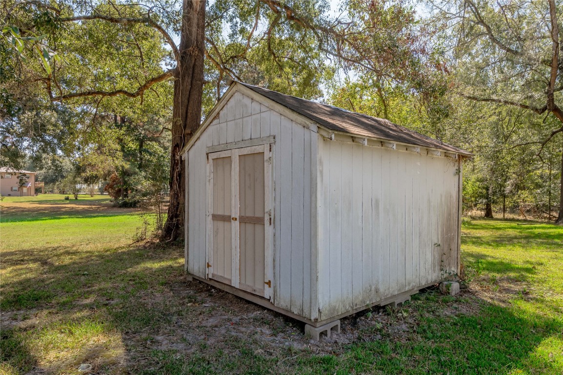 169 Sunset Drive Trinity, TX 75862 - Photo 34 of 36 a backyard of a house with lots of green space