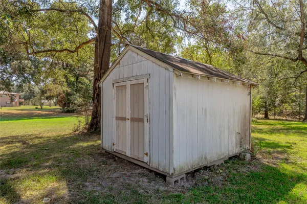 a backyard of a house with lots of green space