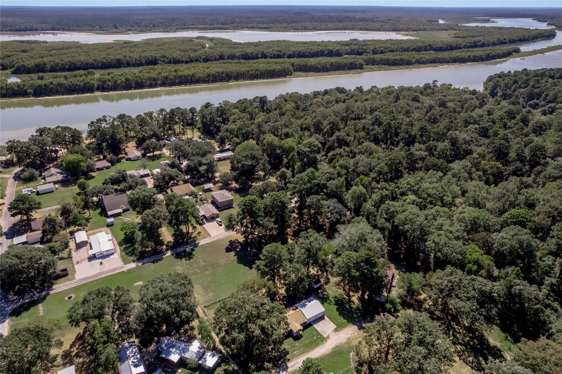 169 Sunset Drive Trinity, TX 75862 - Photo 36 of 36 a view of a lake with a city