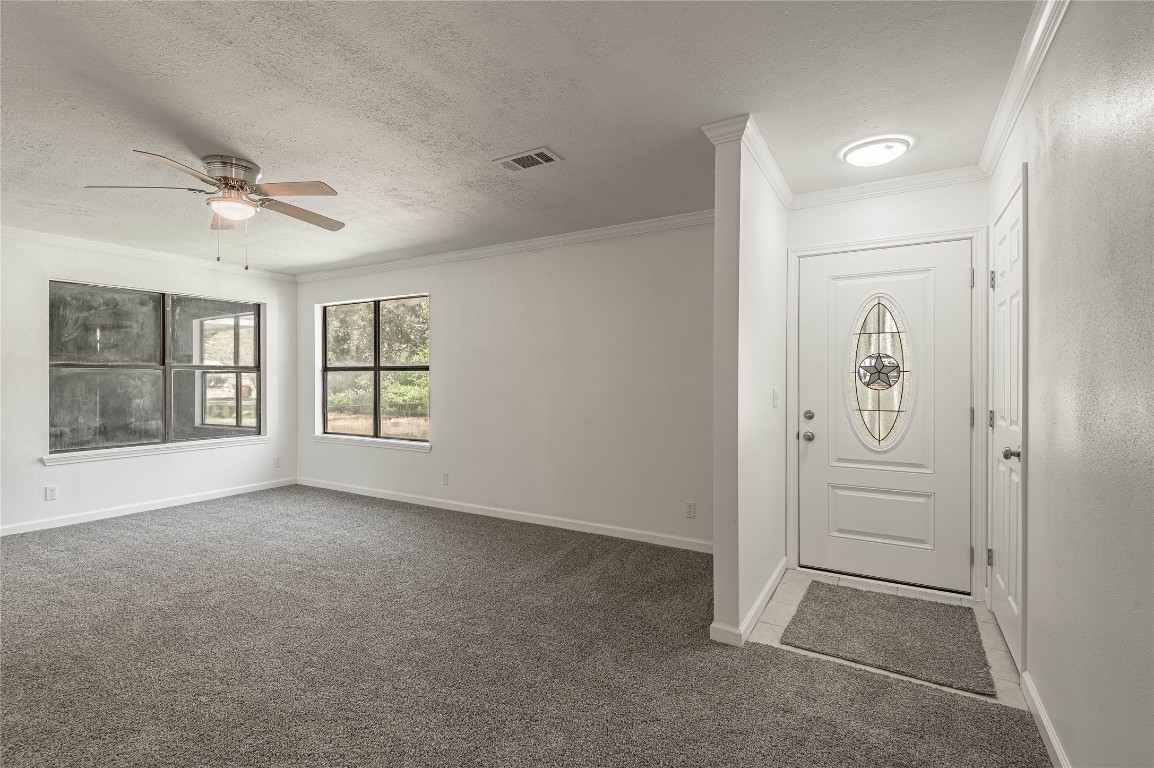 169 Sunset Drive Trinity, TX 75862 - Photo 5 of 36 a view of an empty room with a window