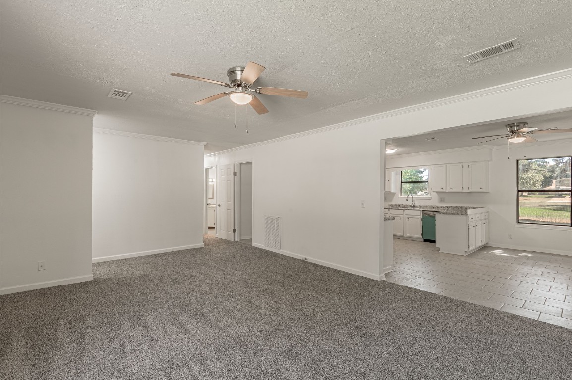 169 Sunset Drive Trinity, TX 75862 - Photo 7 of 36 a view of an empty room with a window