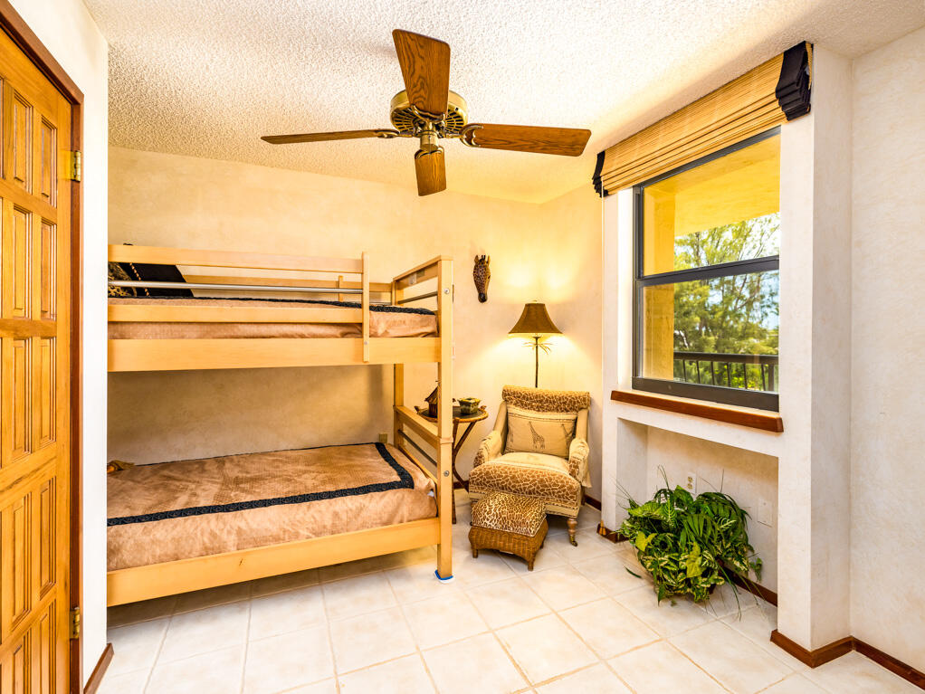 101 East Ocean Drive, Unit C304 Key Colony Beach, FL 33051 - Photo 19 of 39 a bathroom with a tub and a shower