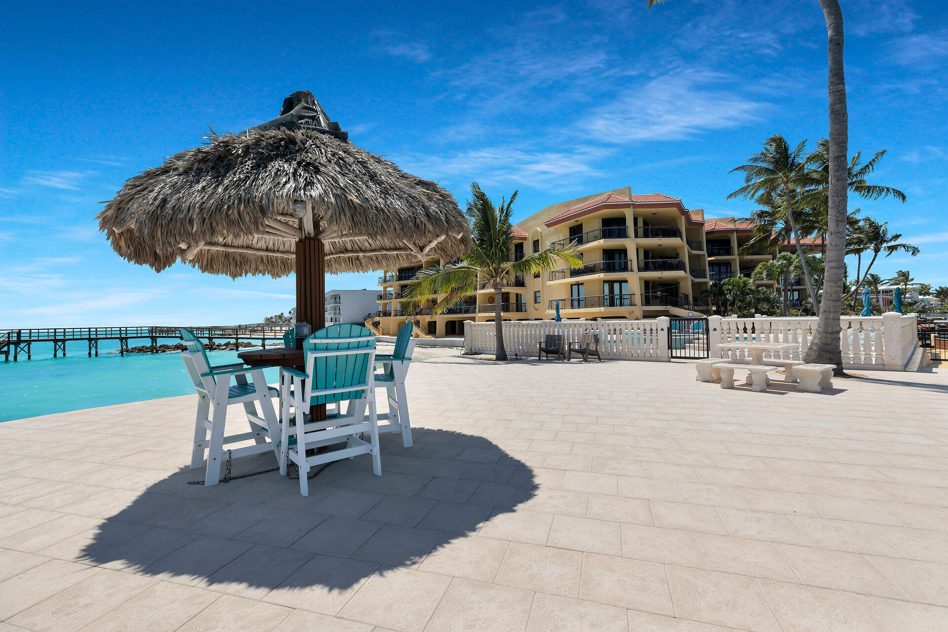 101 East Ocean Drive, Unit C304 Key Colony Beach, FL 33051 - Photo 29 of 39 a view of a swimming pool with a patio