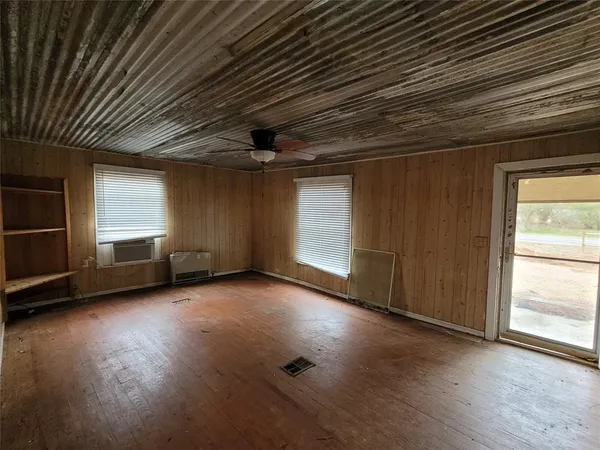 an empty room with windows