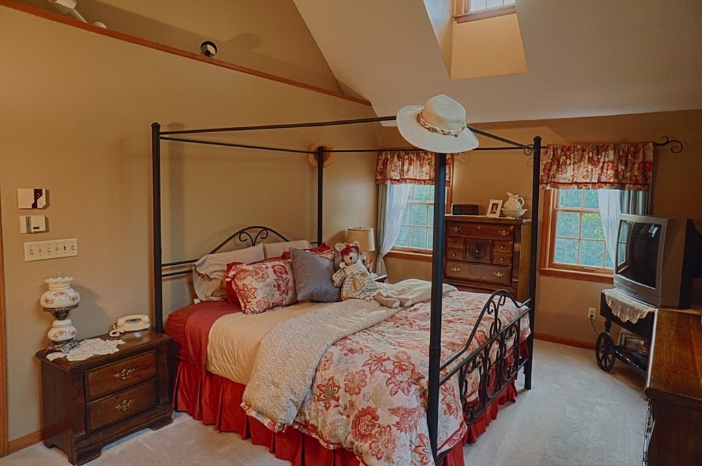93 Crawford Road Rutland, MA 01543 - Photo 13 of 30 a bedroom with a bed and dresser