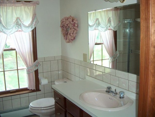 93 Crawford Road Rutland, MA 01543 - Photo 30 of 30 a bathroom with a sink toilet and shower