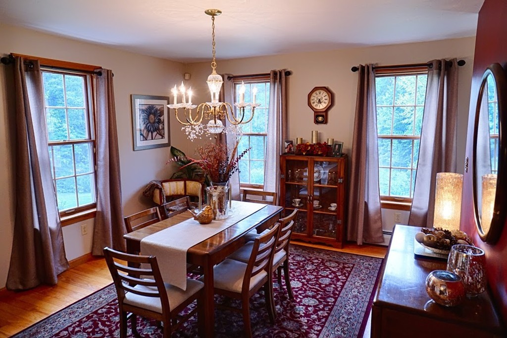 93 Crawford Road Rutland, MA 01543 - Photo 7 of 30 a view of a dining room with furniture window and wooden floor